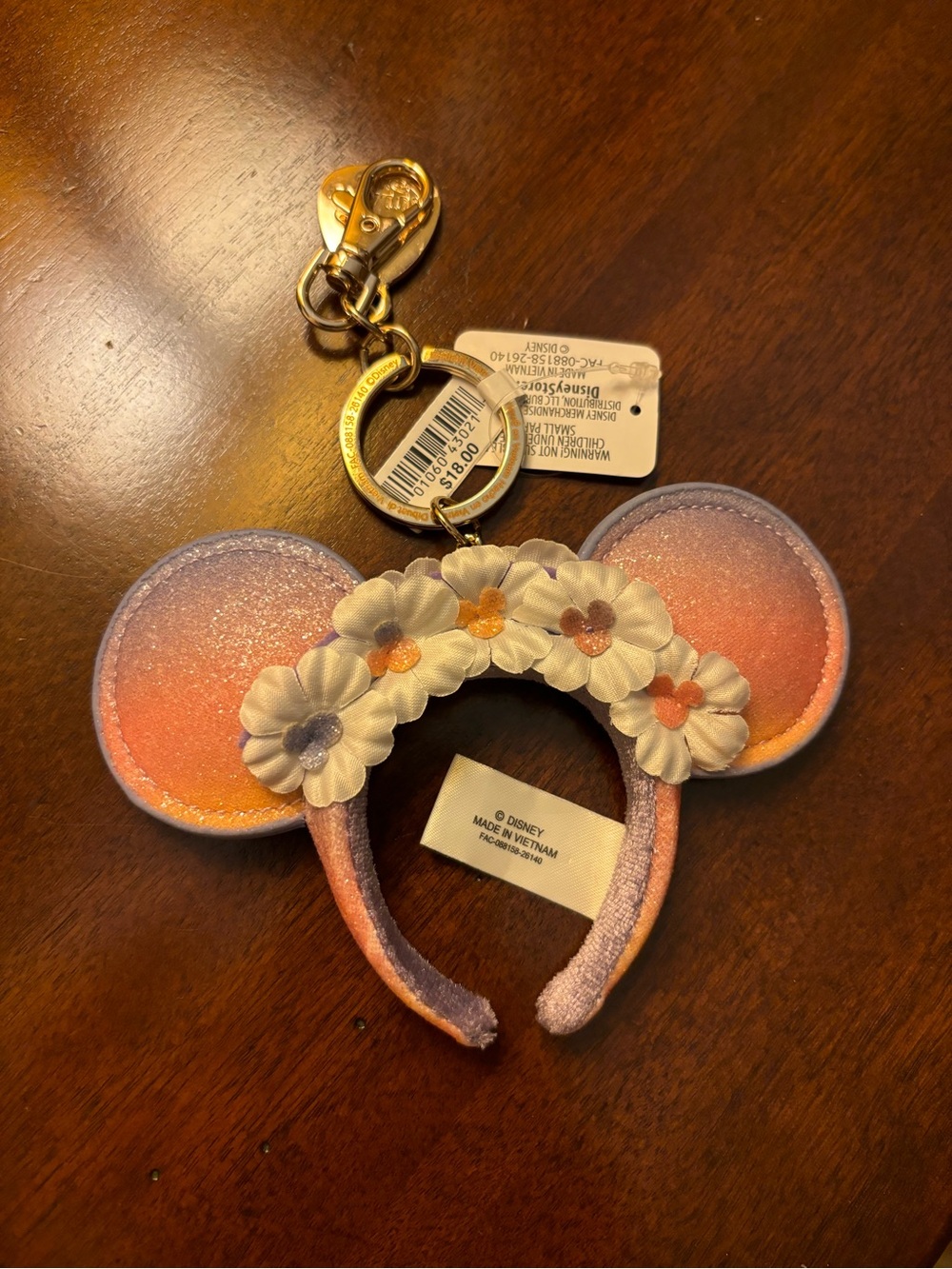 Disney Aulani Minnie Ear Keychain with White Floral Accents